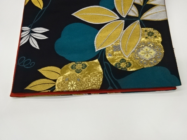  葉に華文模様織出し袋帯